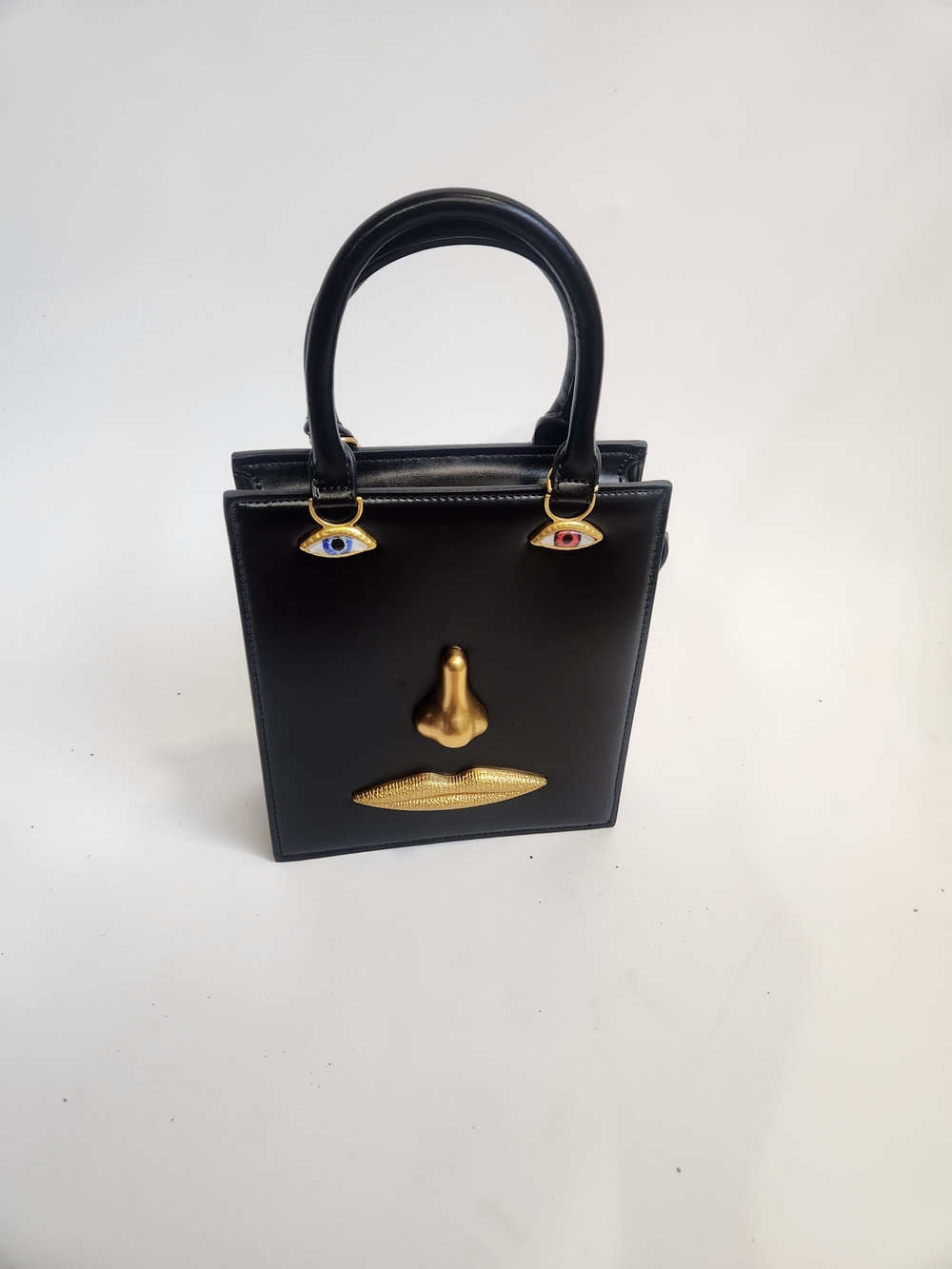 Black  Top Handle Purse with Gold Face Accents